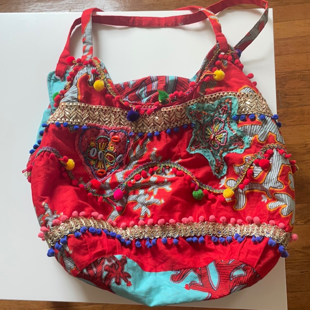 Bought in Italian boutique. used twice. Zip closure, cotton Lining is polyester.